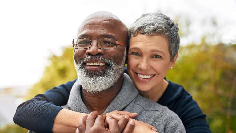 A Biracial couple with Dental Crowns in Bastrop TX