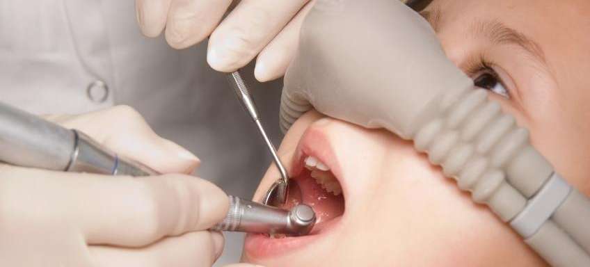A kid getting a Dental exam in Bastrop tx
